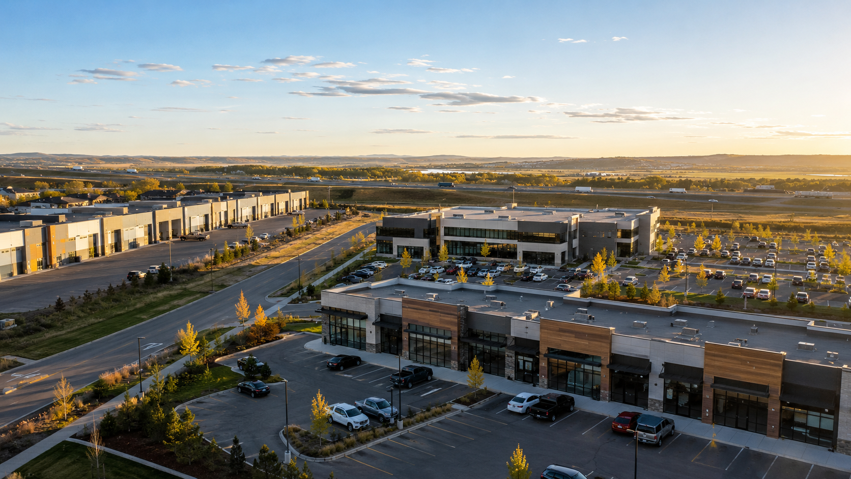 Aerial view of Airdrie commercial business park at golden hour